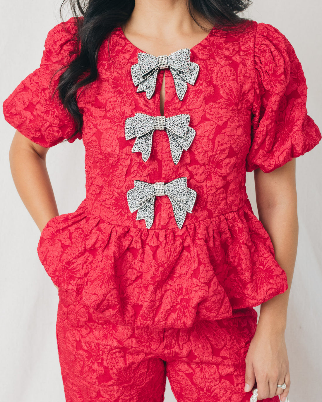 Arielle Jacquard Front Bow Peplum Top