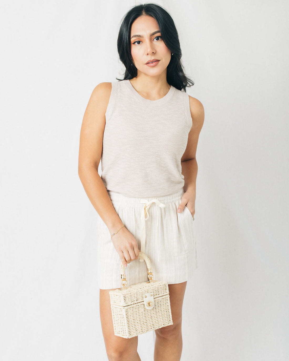 Grind Sleeveless Round Neck Knit Top
